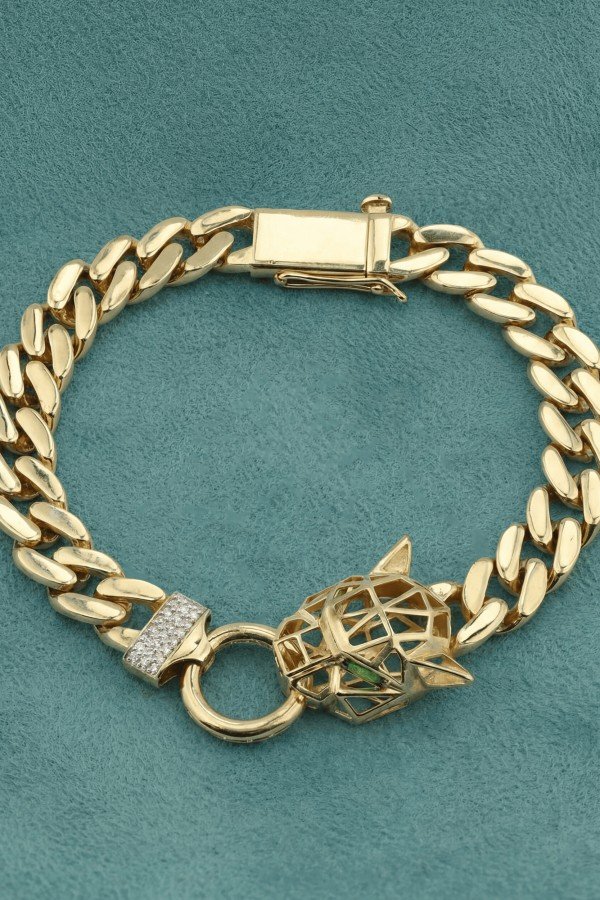 Браслет из лимонного золота c бриллиантами и изумрудом