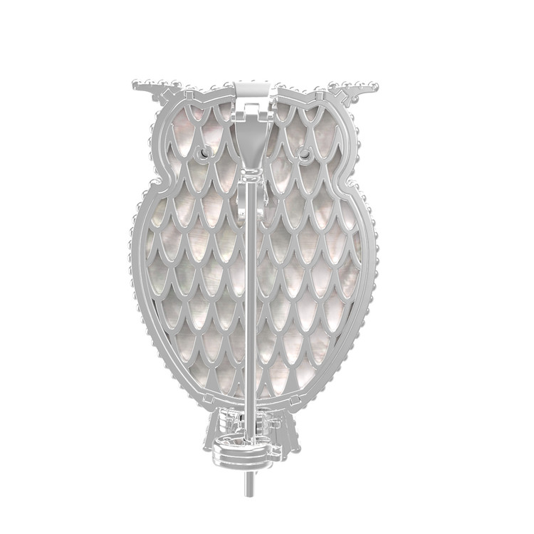 Брошь из белого золота c эмалью, ониксом и перламутром