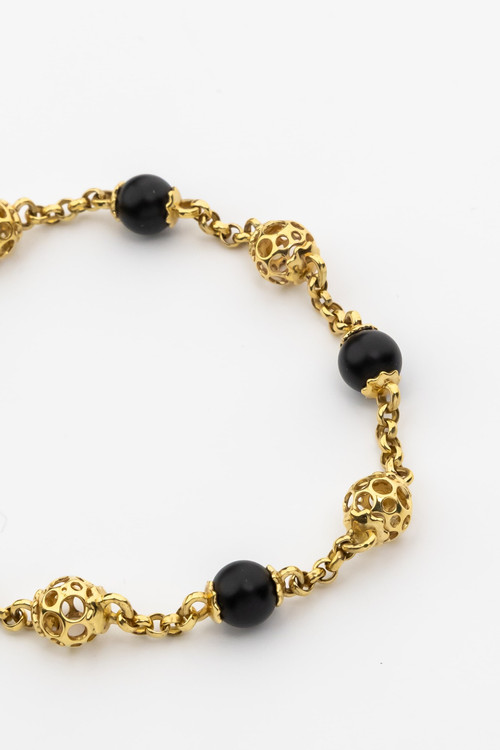 Браслет из лимонного золота c ониксом