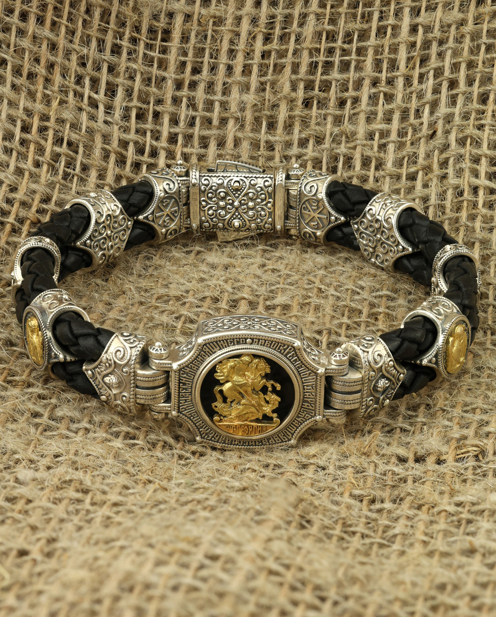 Браслет из серебра и золота c кожаным шнурком и ониксом