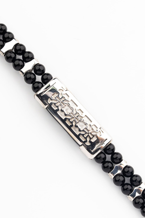 Браслет из белого золота c бриллиантами и ониксом