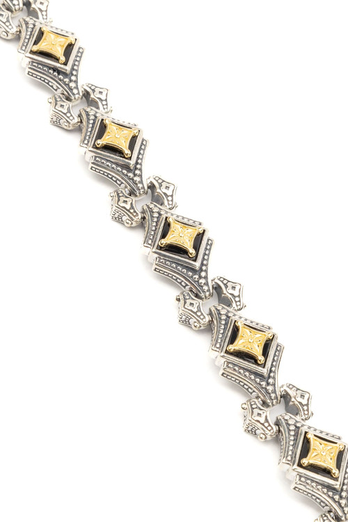 Браслет из серебра и золота c ониксом и рубином